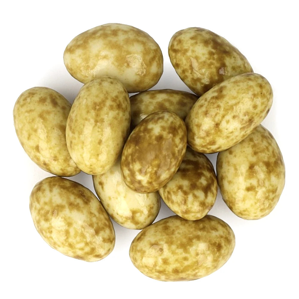 Widok z góry na produkt Migdały w białej czekoladzie z zielona herb 200 g