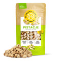 Opakowanie produktu Pistacje prażone solone 1000 g na dekoracyjnym tle